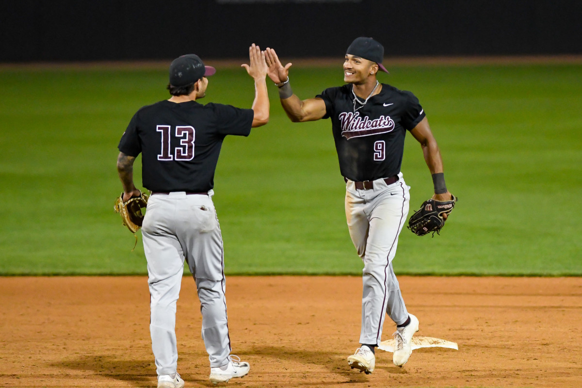 Bethune-Cookman's Malik Stephens delivers a high-five to teammate Brian Perez as the Wildcats won its Friday matchup against Grambling State.